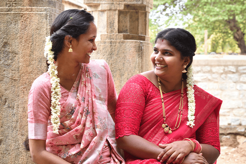 Women talking and smiling