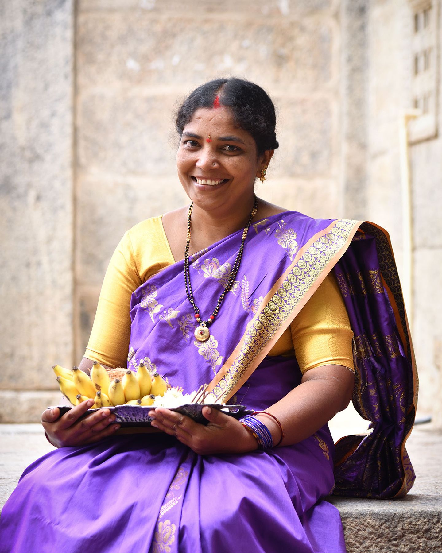 Portrait of a woman with a plate