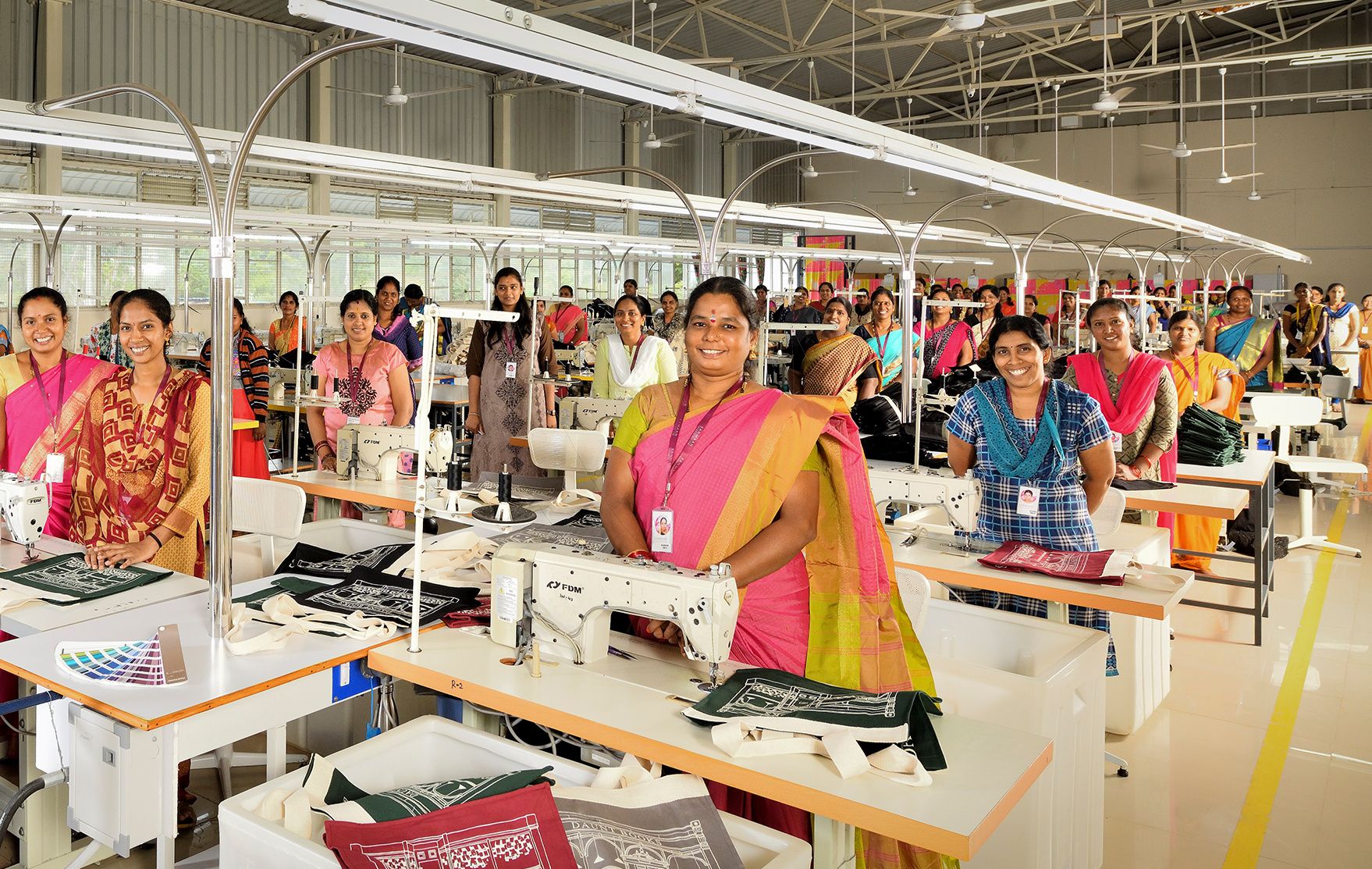 Artisans at their sewing machines